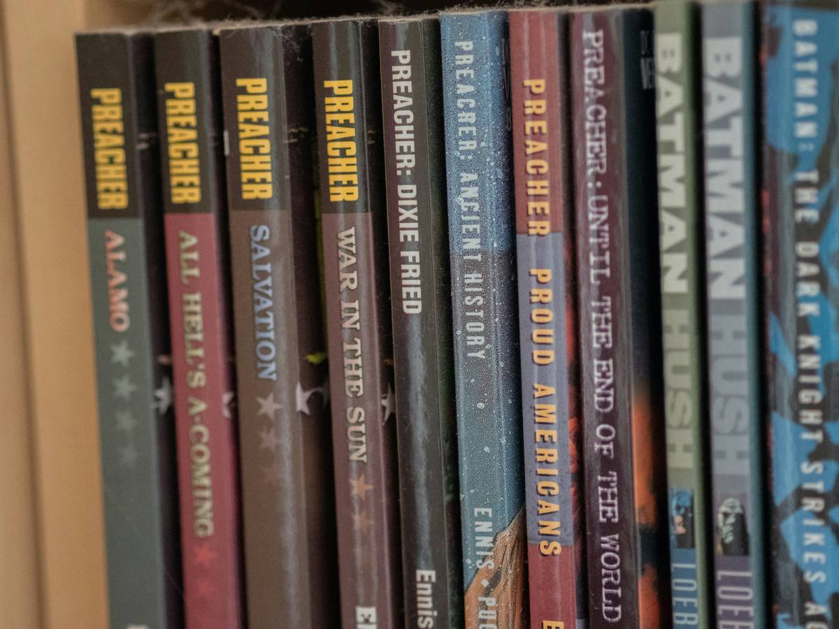 Stack of books on zombie apocalypse showing realistic survival themes